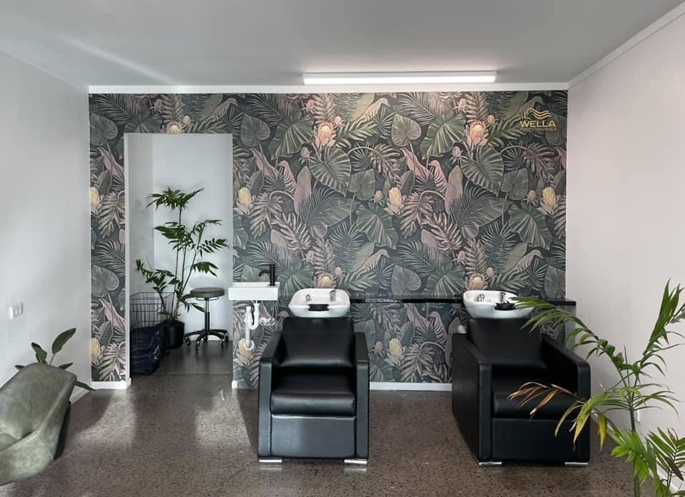 Wella Professionals printed feature wallpaper in a salon